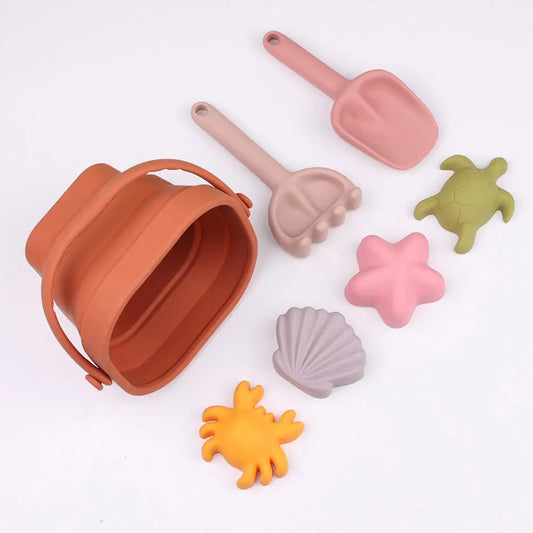Soft and durable BPA-free silicone beach toy set with crab, starfish, turtle, and shell moulds