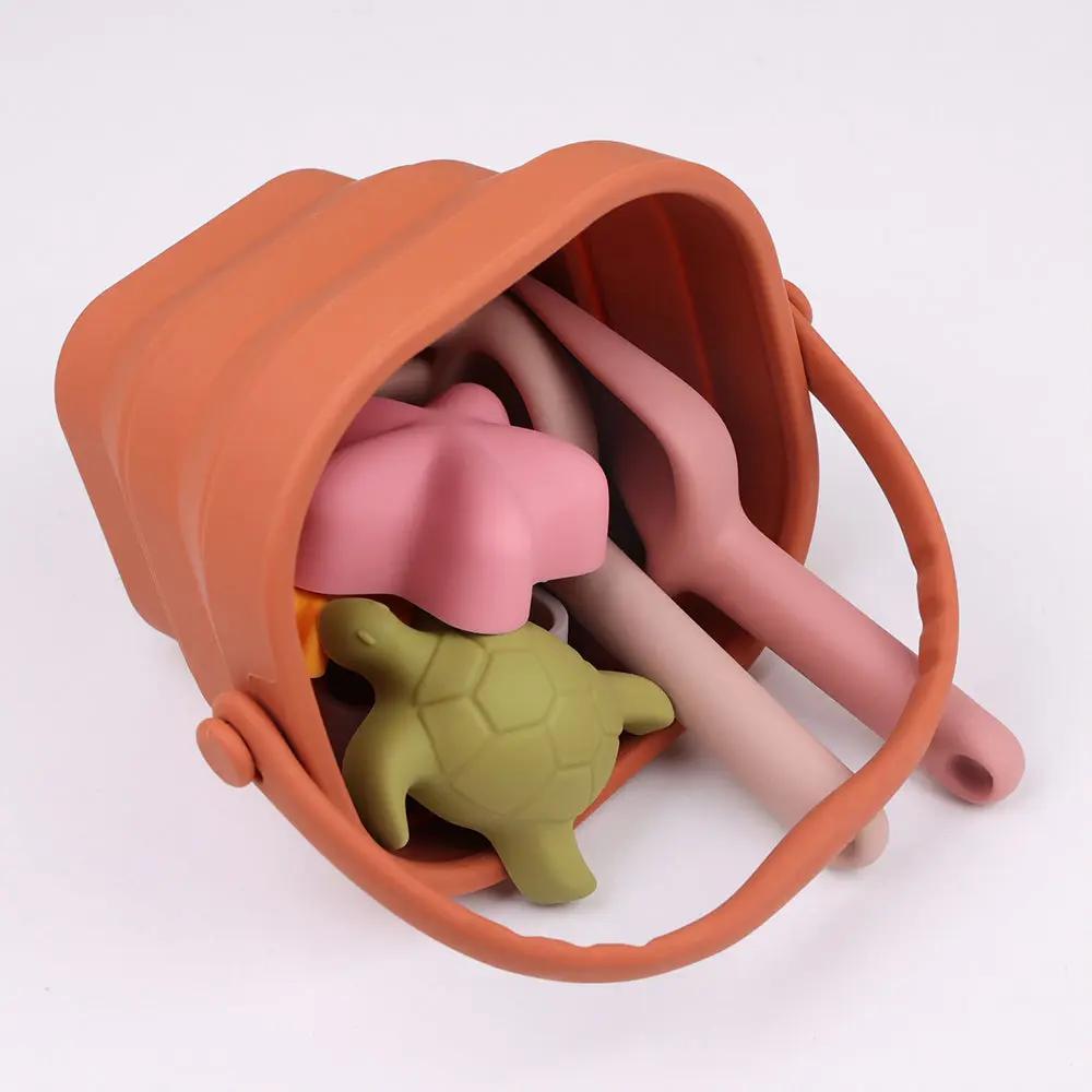 Silicone beach bucket and sand moulds set for toddlers, safe and easy to clean
