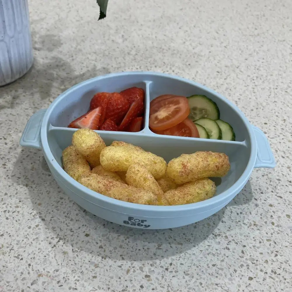 Blue silicone bowl with food