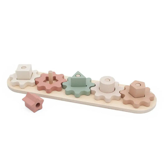 Wooden shape sorting toy with pastel-coloured shapes on a white background