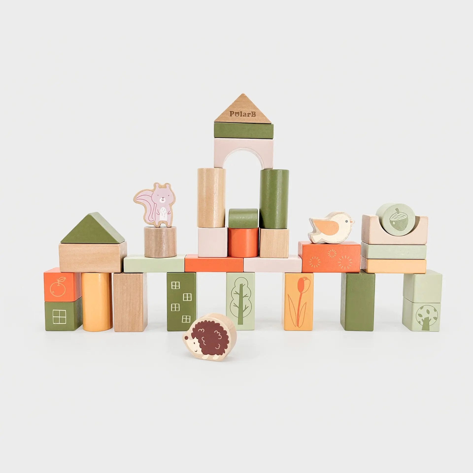 Set of wooden blocks with animal designs on a white background