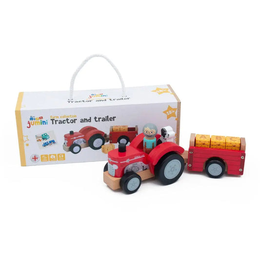 Wooden toy tractor and trailer set with packaging on a white background