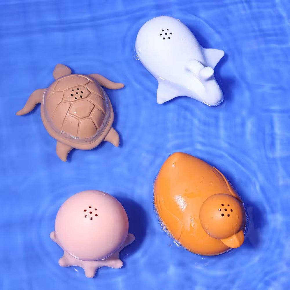 Turtle, whale, octopus and duck bath toys