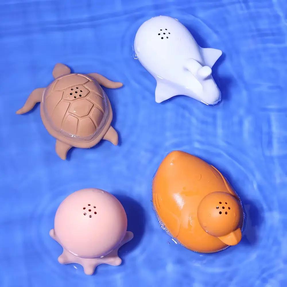 Turtle, whale, octopus and duck bath toys