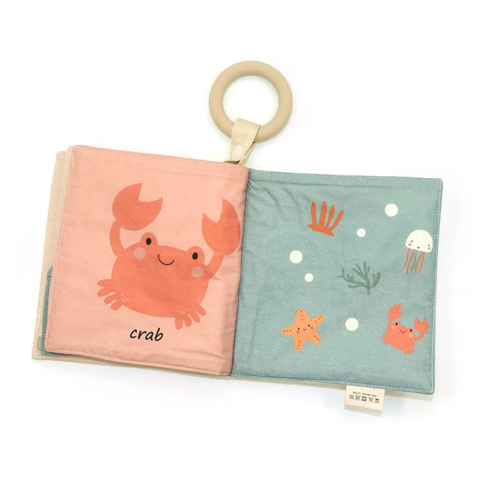 Soft baby book with teething ring