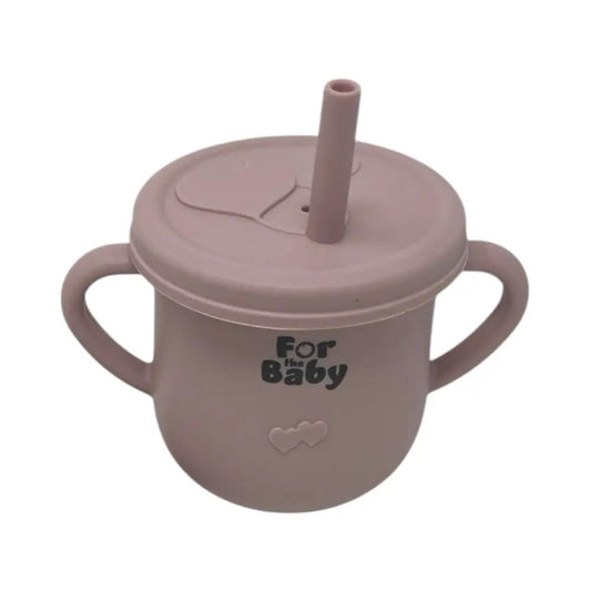 Pink silicone sippy cup