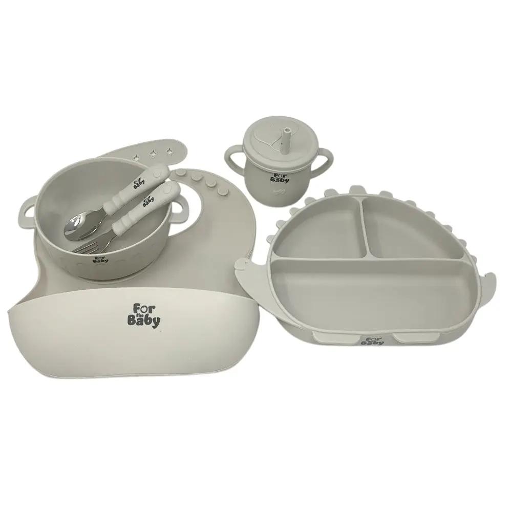 Silicone feeding set with suction plate, bowl, sippy cup, fork, spoon, and bib