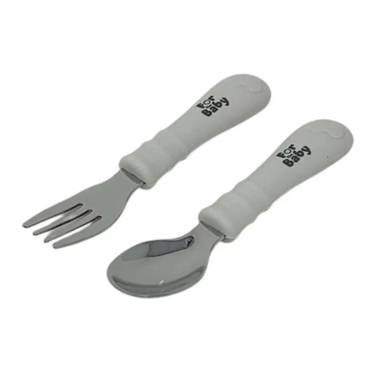 Toddler stainless steel fork and spoon set with soft silicone handles, designed for easy grip and independent eating.