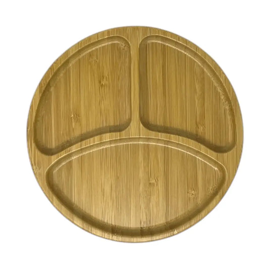 aerial shot of round bamboo plate for babies