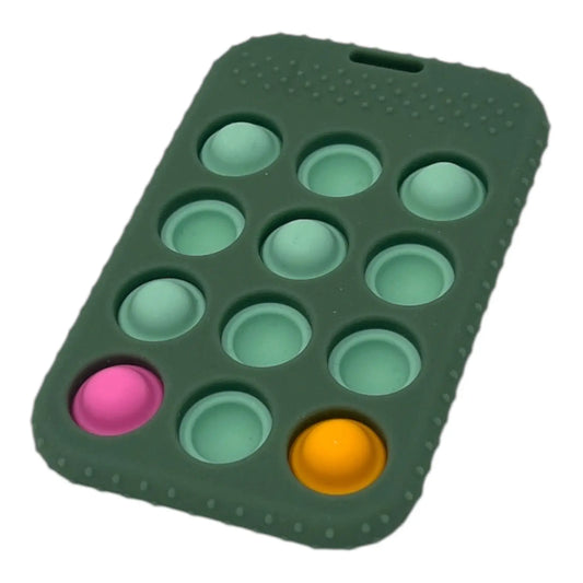 Green silicone pop-it fidget toy with colourful buttons on a white background