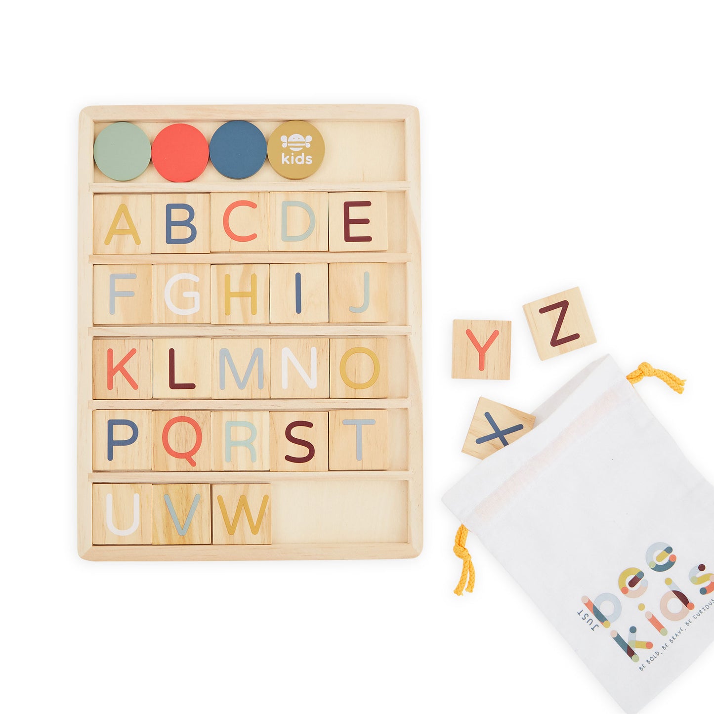 Wooden alphabet blocks with colourful letters and a pouch on a white background