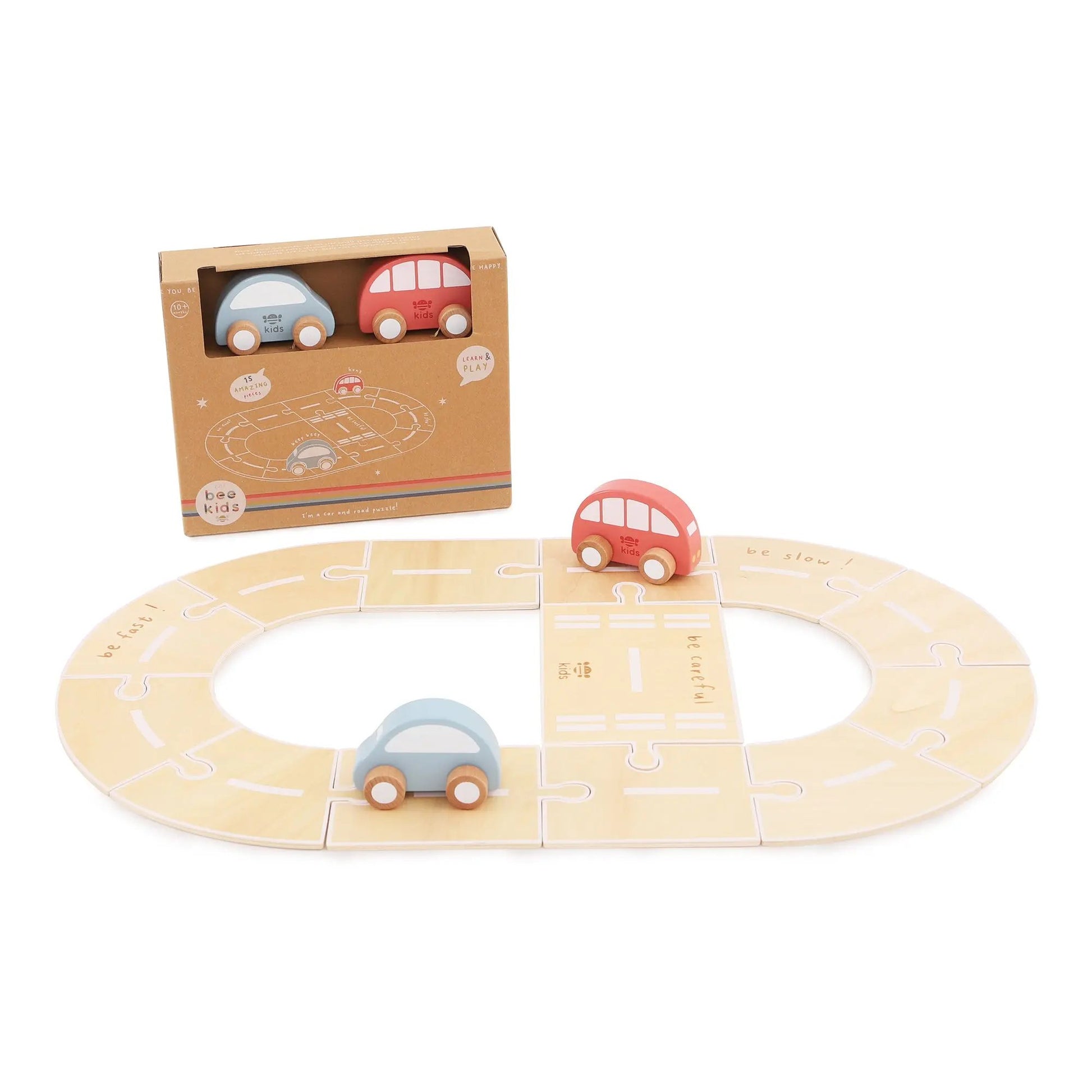 Wooden toy track with cars on a white background also showing packaging