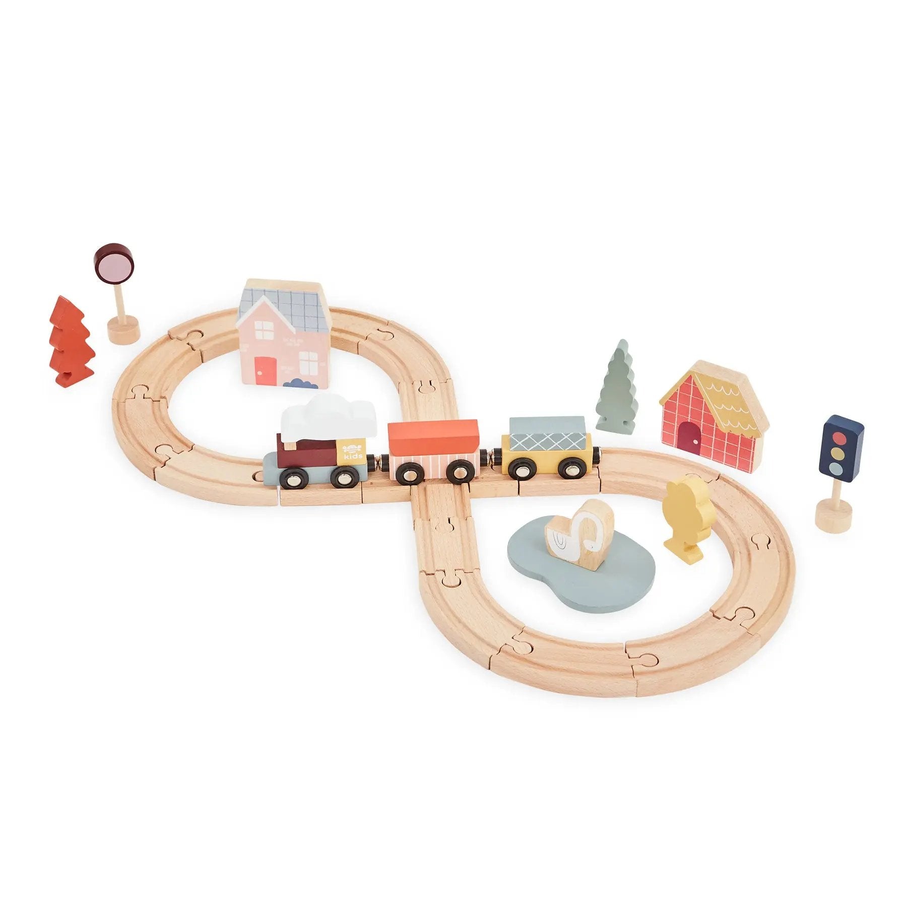 Wooden train set with tracks, houses, and vehicles on a white background