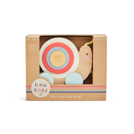 Wooden toy snail in a 'just bee kids' packaging on a white background