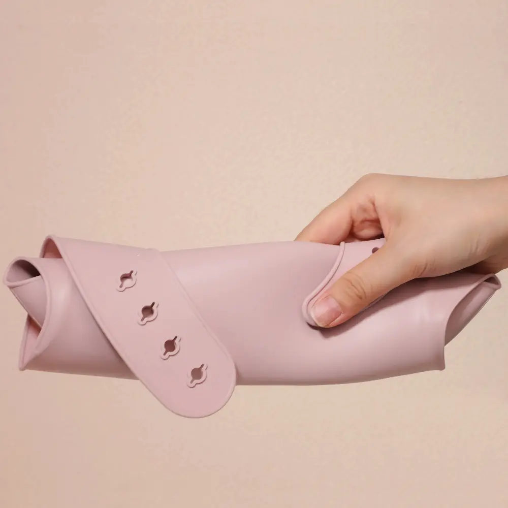 Silicone baby bib rolled up