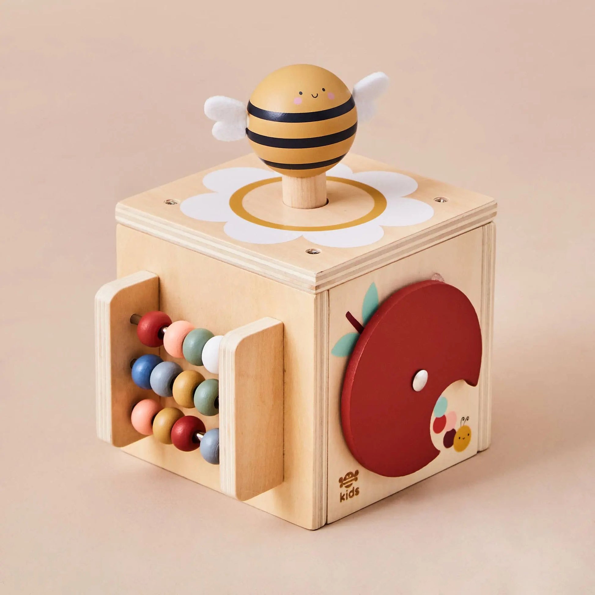A vibrant wooden activity cube with colorful bead mazes, a mirror, and a spinning apple.
