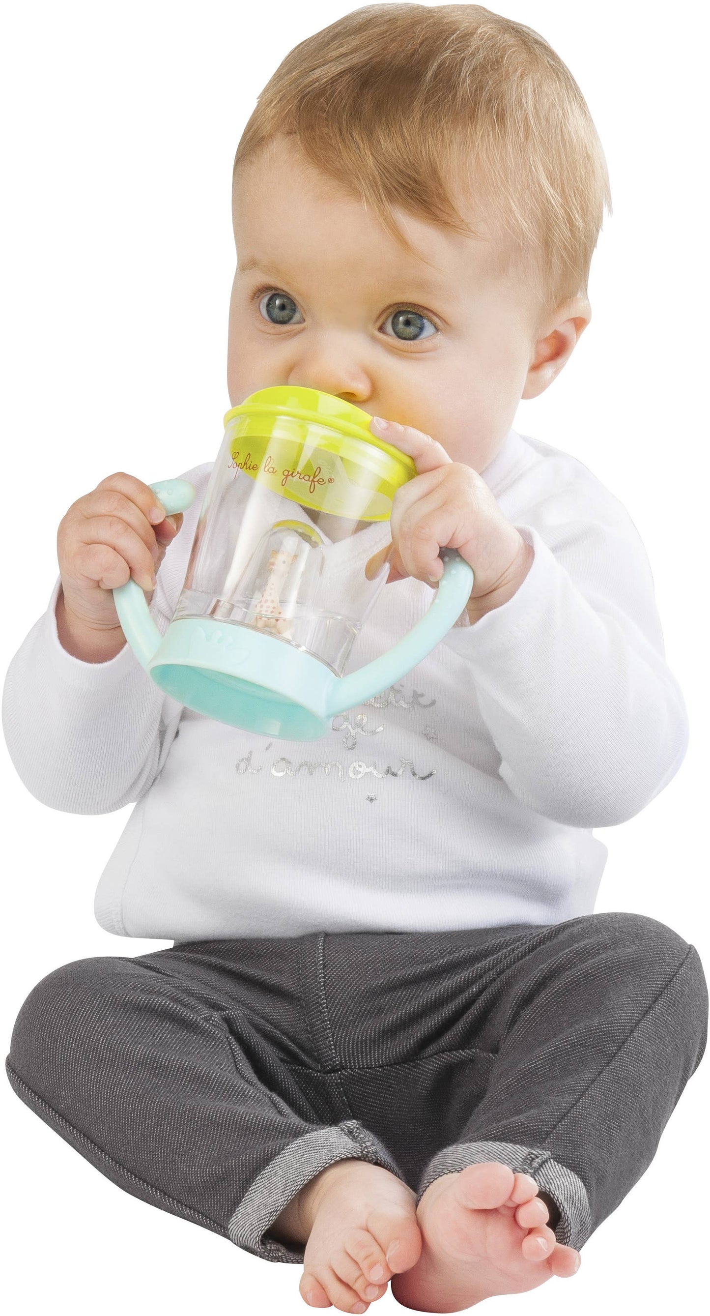 Baby drinking from the Sophie la Girafe Non-Spill Cup