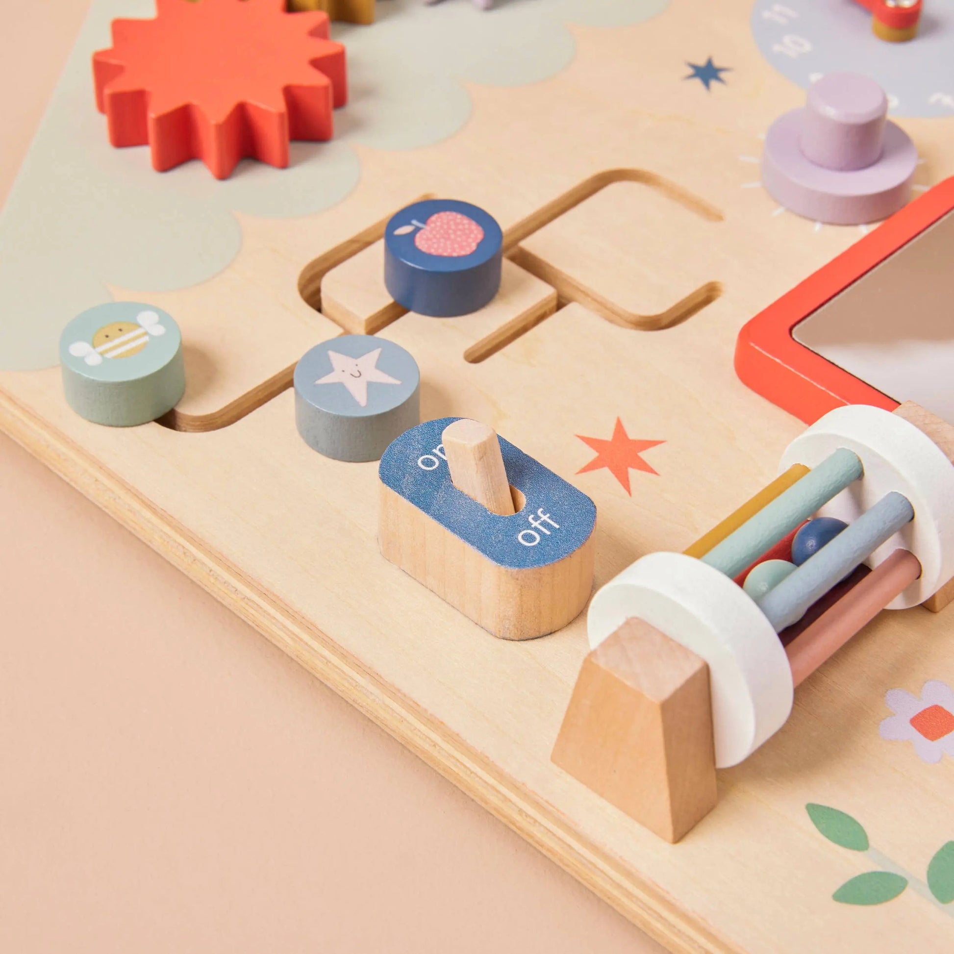 Wooden Busy Board close up of switch and wheel