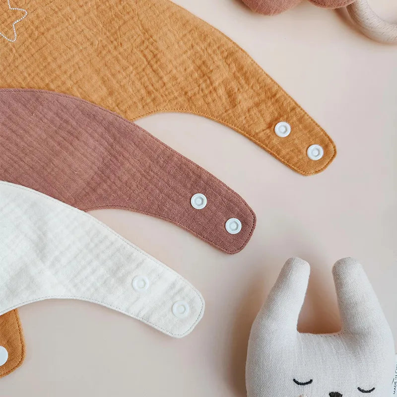 Shop muslin bandana bibs at For the Baby