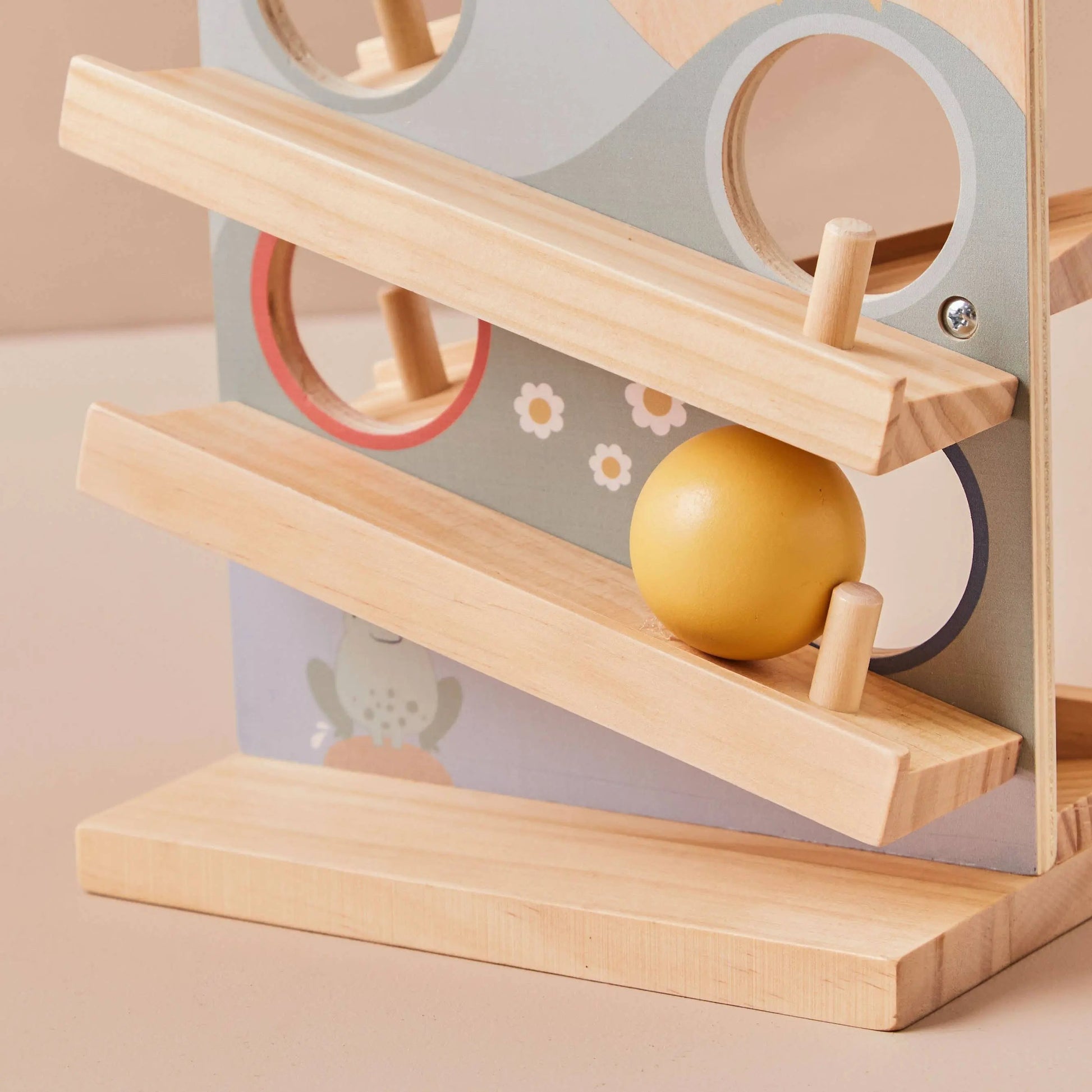 Wooden Ball Runner Toy showing yellow ball
