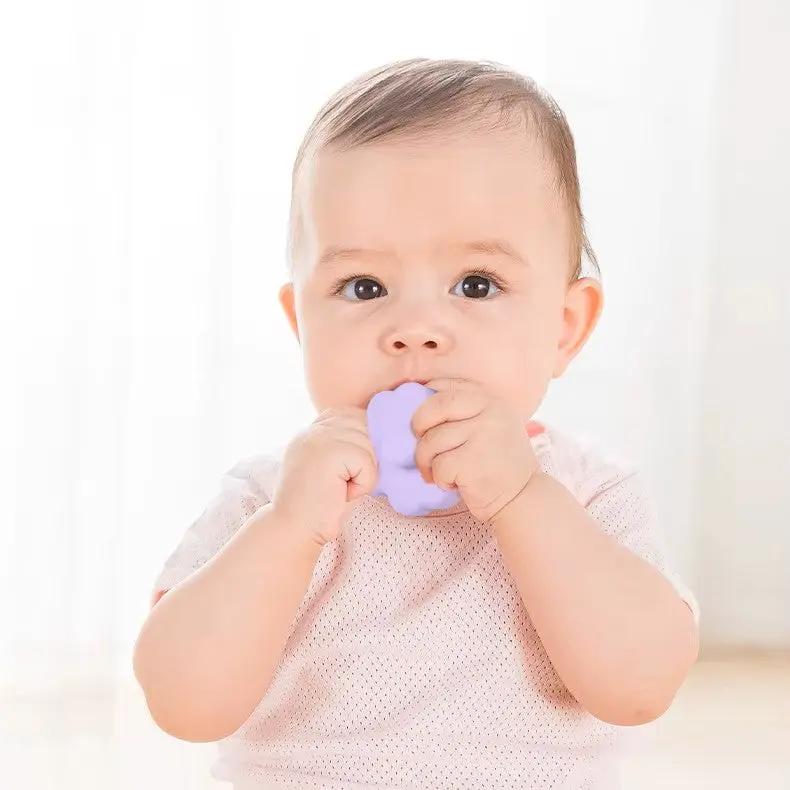 baby chewing flower stacking toy