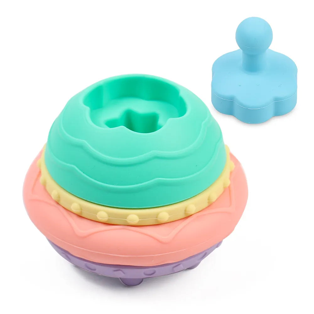 Soothing teething relief with the Silicone Flying Saucer Stacking Toy.