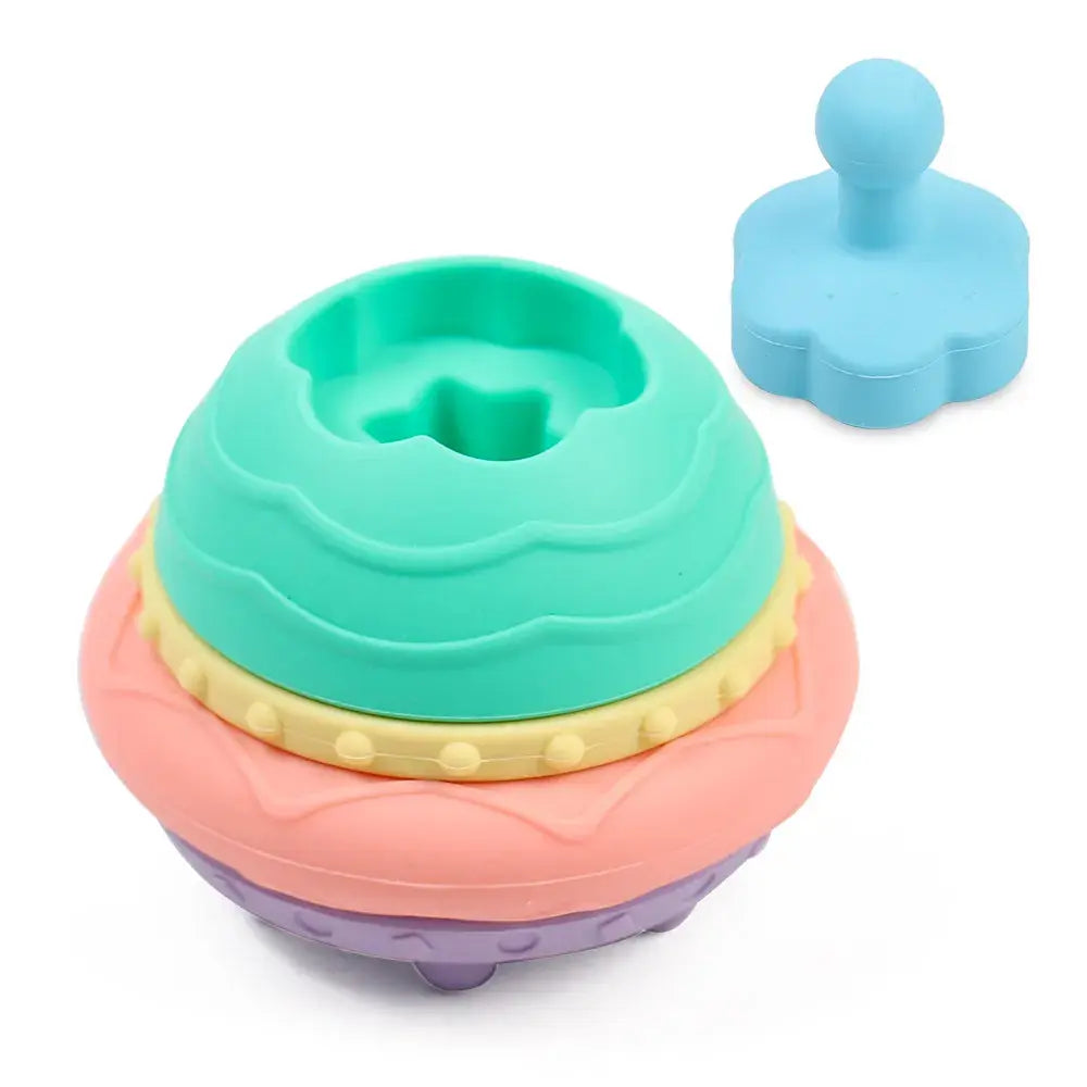 Soothing teething relief with the Silicone Flying Saucer Stacking Toy.