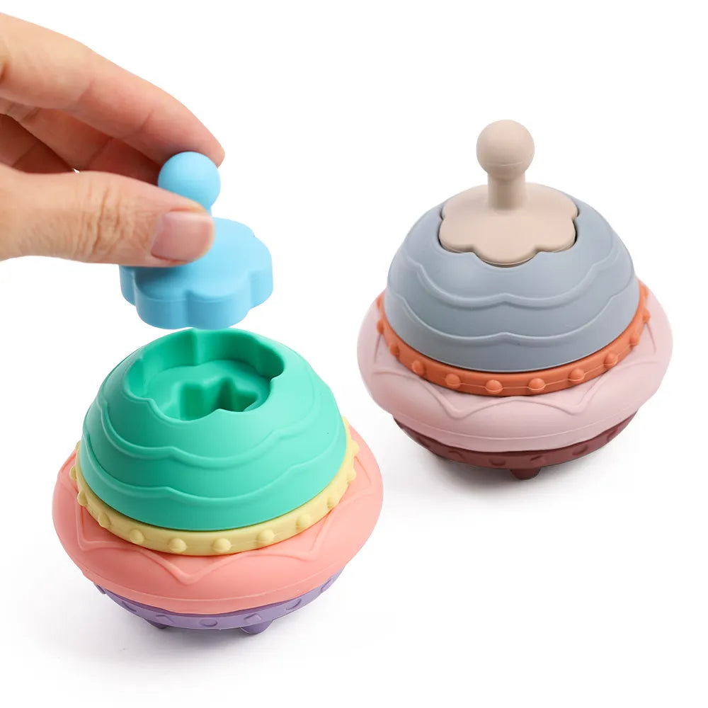 Soothing teething relief with the Silicone Flying Saucer Stacking Toy.