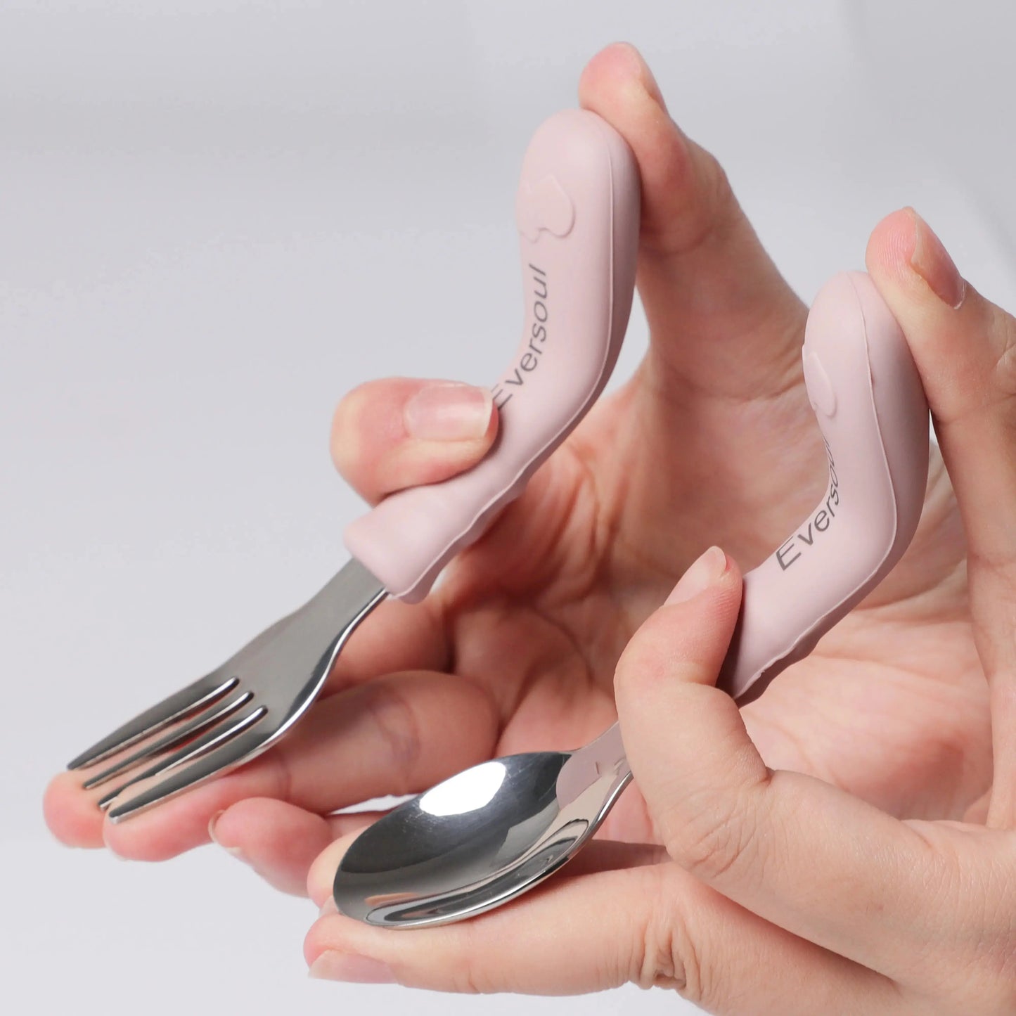 Gift-ready stainless steel and silicone baby cutlery set, ideal for mealtime training.