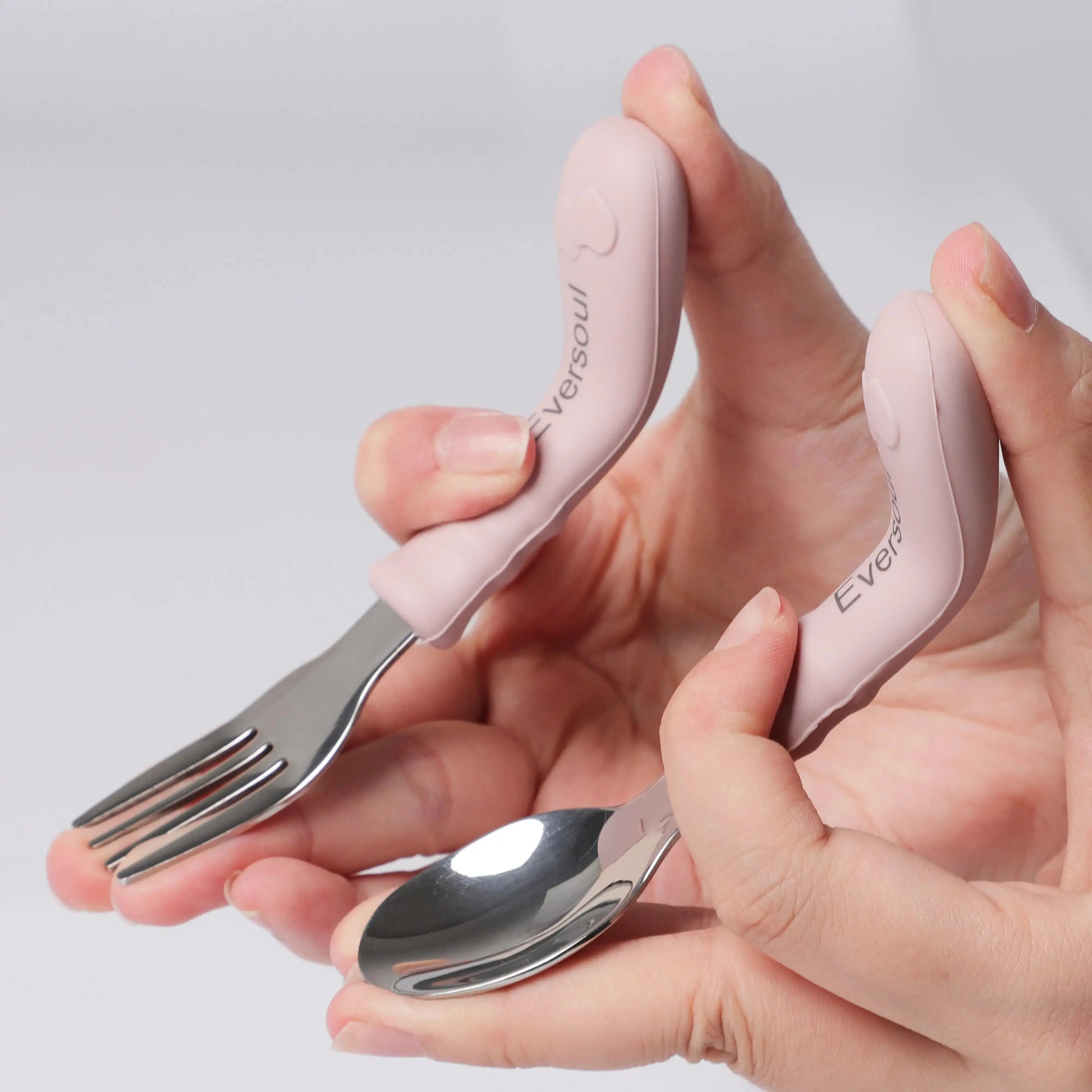 Gift-ready stainless steel and silicone baby cutlery set, ideal for mealtime training.