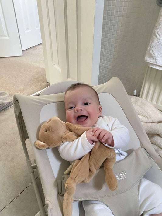 Baby with comforter