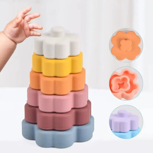Baby hand with stacking toy