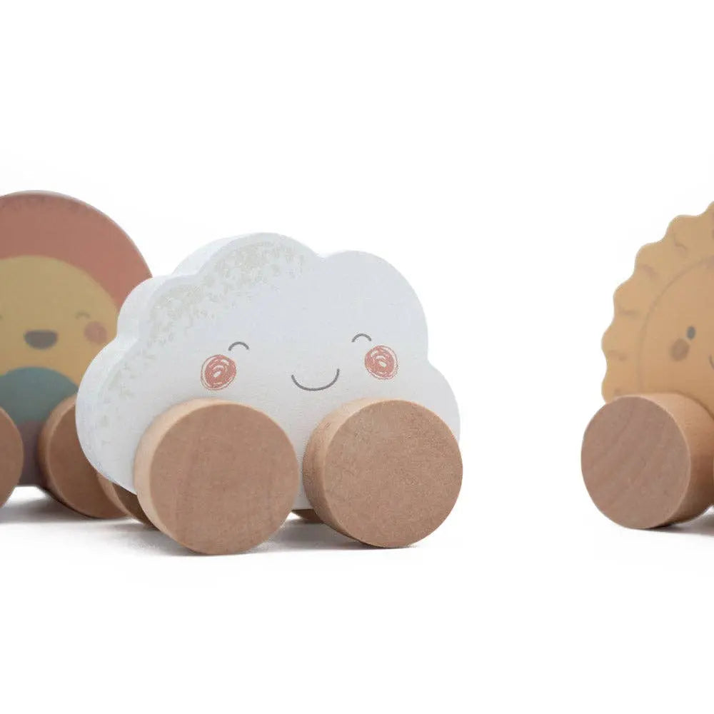 Set of wooden toys with a cloud-shaped character and other figures on a white background