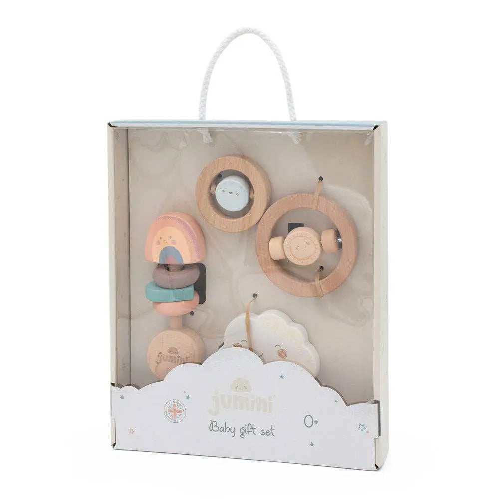 Set of wooden baby toys in a packaging box on a white background