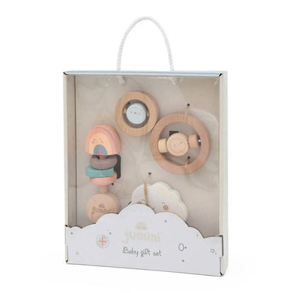 Set of wooden baby toys in a packaging box on a white background