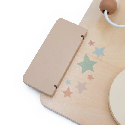Wooden toy with star patterns on a white background