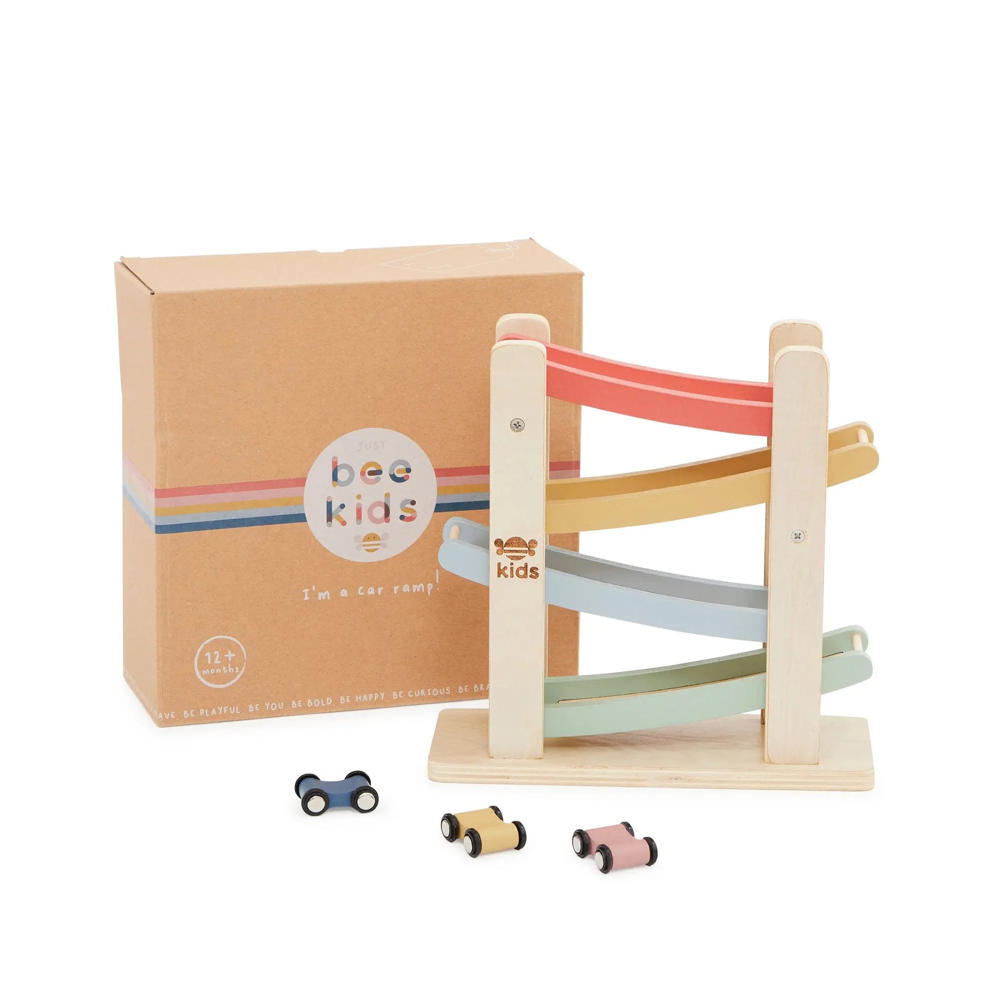 Wooden toy track set with cars and packaging on a white background