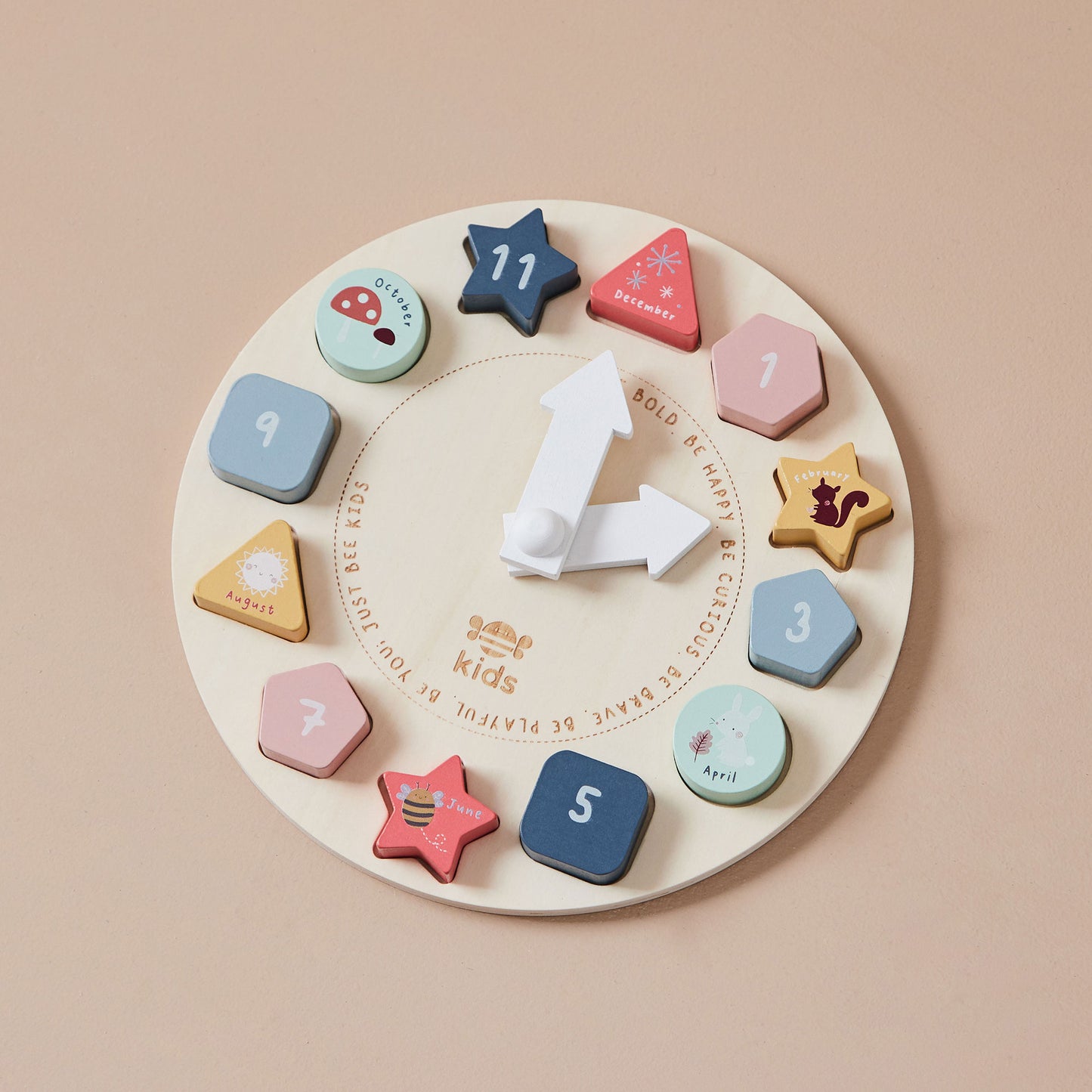 Wooden educational clock toy with colourful shapes and numbers on a beige background