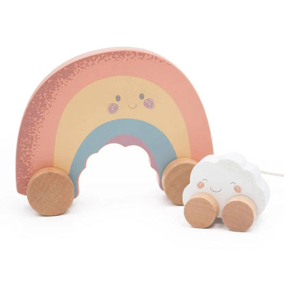 Wooden rainbow and cloud toy with smiling faces on a white background