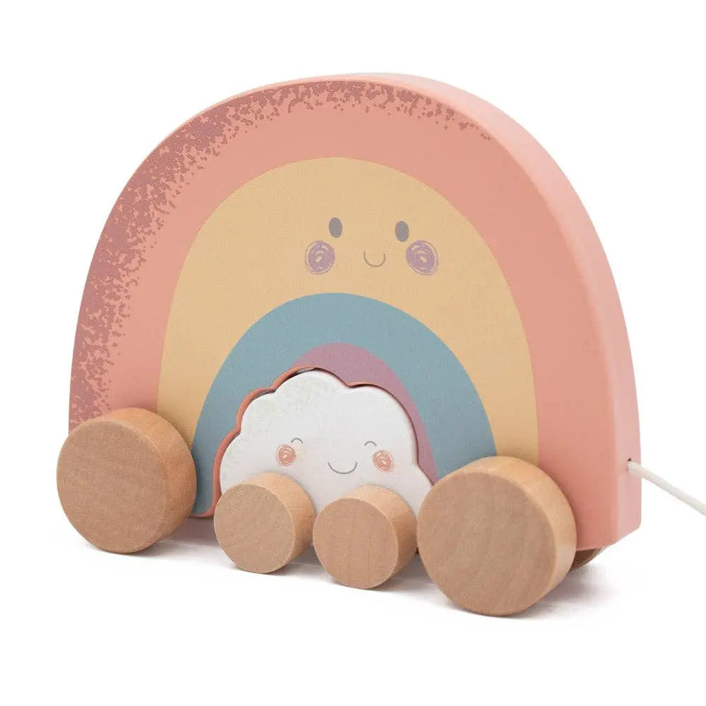 Children's toy with a rainbow design and smiling face on a white background