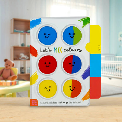 Colour mixing book for children with colourful slides on a wooden surface