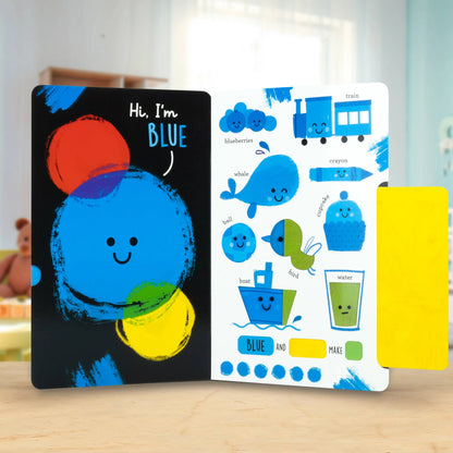 Children's educational book with a blue character on a wooden surface