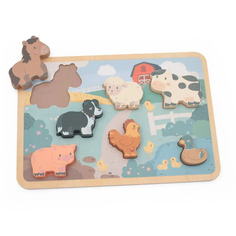 Wooden farm animal puzzle with colourful animal figures on a wooden board with a farm illustration.