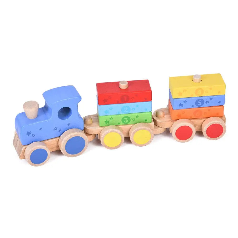 A wooden toy train with a blue locomotive pulling two cargo cars carrying colourful stacked blocks, photographed on a plain white background.