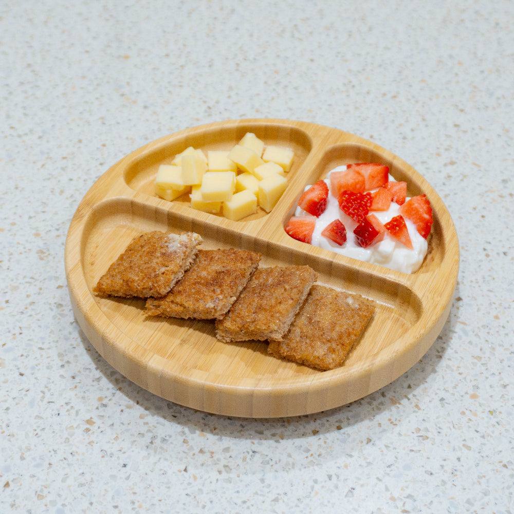 round bamboo plate with snacks