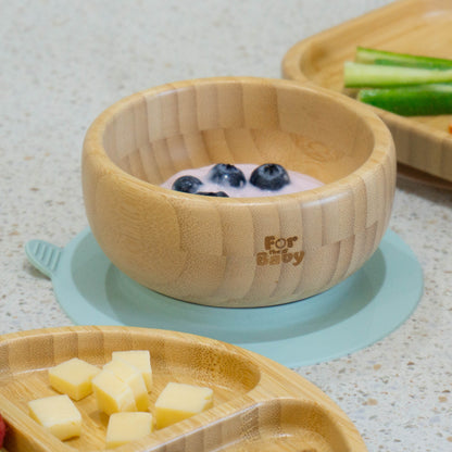 bamboo bowl with suction full of yoghurt