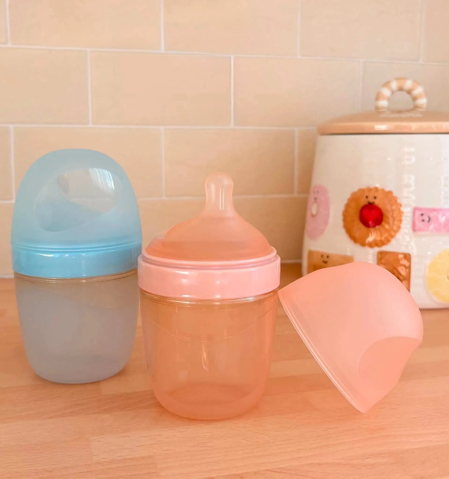 Baby bottles sat next to each other