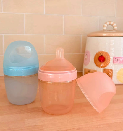 Baby bottles sat next to each other