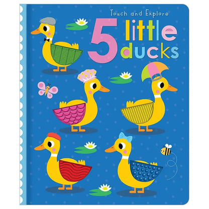 A children's book cover titled '5 little ducks' with a blue background and five cartoon ducks wearing different colourful hats and outfits. The title text is large and multicoloured at the top, and the book has a white spiral binding visible along the left edge.
