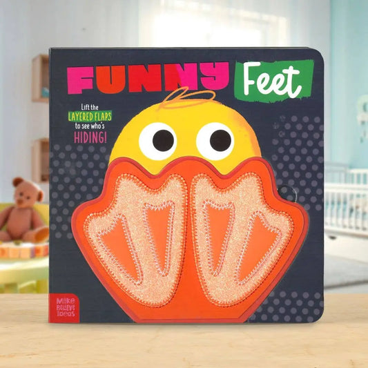 Children's book titled 'Funny Feet' with a cartoon chick design on a wooden surface.